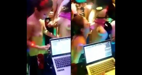 Galera se aproveitando das novinhas peladas no palco do baile funk
